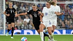 England's Georgia Stanway vies for the ball with Austria's Laura Wienroither, centre, during their Women Euro 2022 match in Manchester, England, July 6, 2022. 