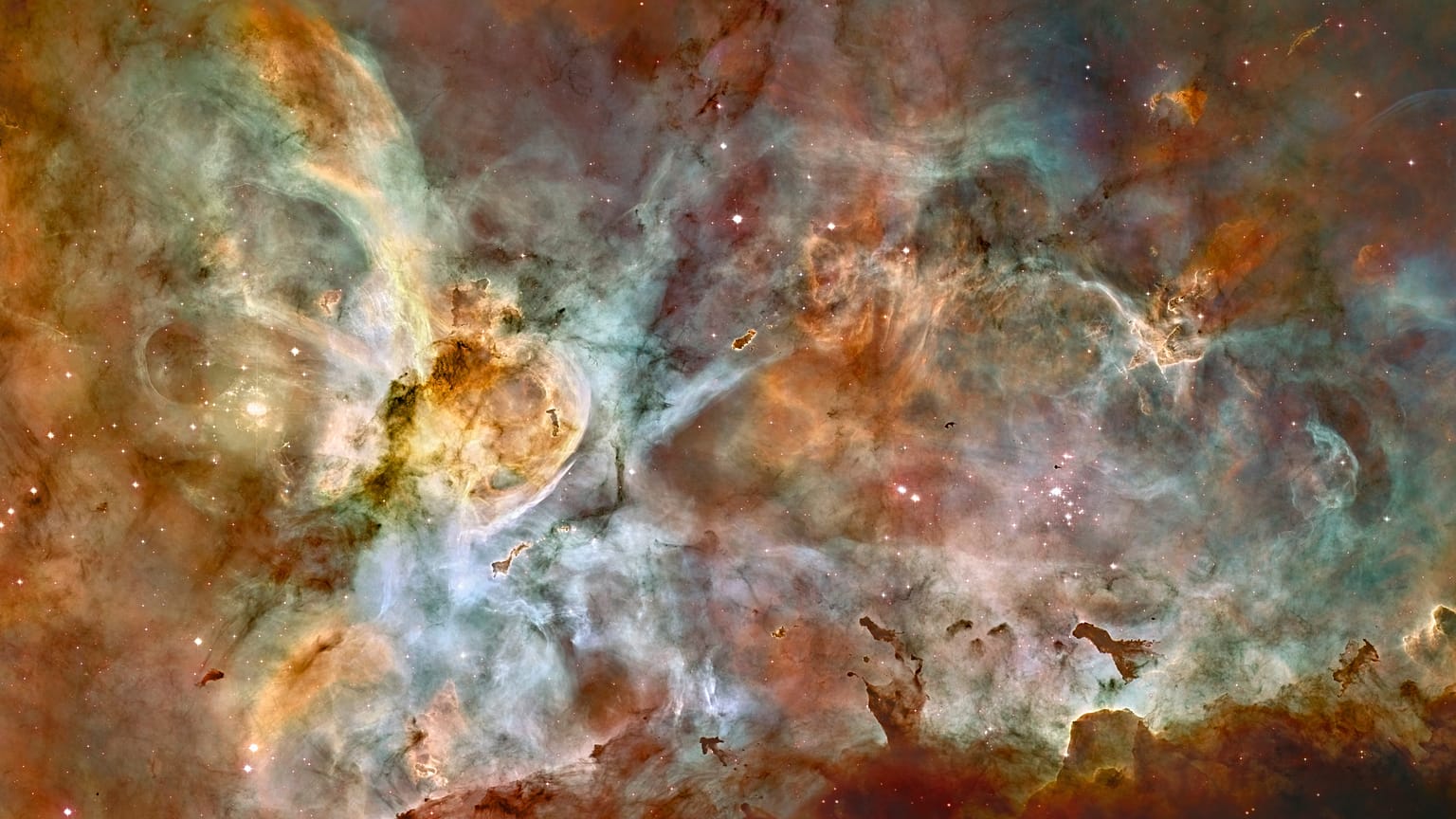 Hubble Uzay Teleskobu'nun çektiği, NASA ve ESA tarafından renklendirilen Carina Nebulası fotoğrafı
