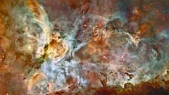 Hubble Uzay Teleskobu'nun çektiği, NASA ve ESA tarafından renklendirilen Carina Nebulası fotoğrafı
