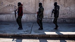 US-backed Syrian Democratic Forces soldiers search for IS militants in Hassakeh.