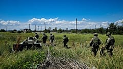 Russian mine clearing experts in territory controlled by the self-proclaimed Donetsk People's Republic, on a trip organised by the Russian Defence Ministry, July 13, 2022.