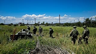 Russian mine clearing experts in territory controlled by the self-proclaimed Donetsk People's Republic, on a trip organised by the Russian Defence Ministry, July 13, 2022.