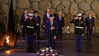 US President Joe Biden lays a wreath of flowers at the Hall of Remembrance of the Yad Vashem Holocaust Memorial museum in Jerusalem.
