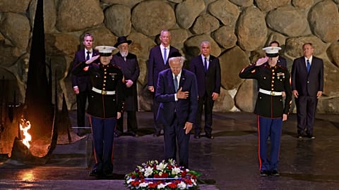US President Joe Biden lays a wreath of flowers at the Hall of Remembrance of the Yad Vashem Holocaust Memorial museum in Jerusalem.