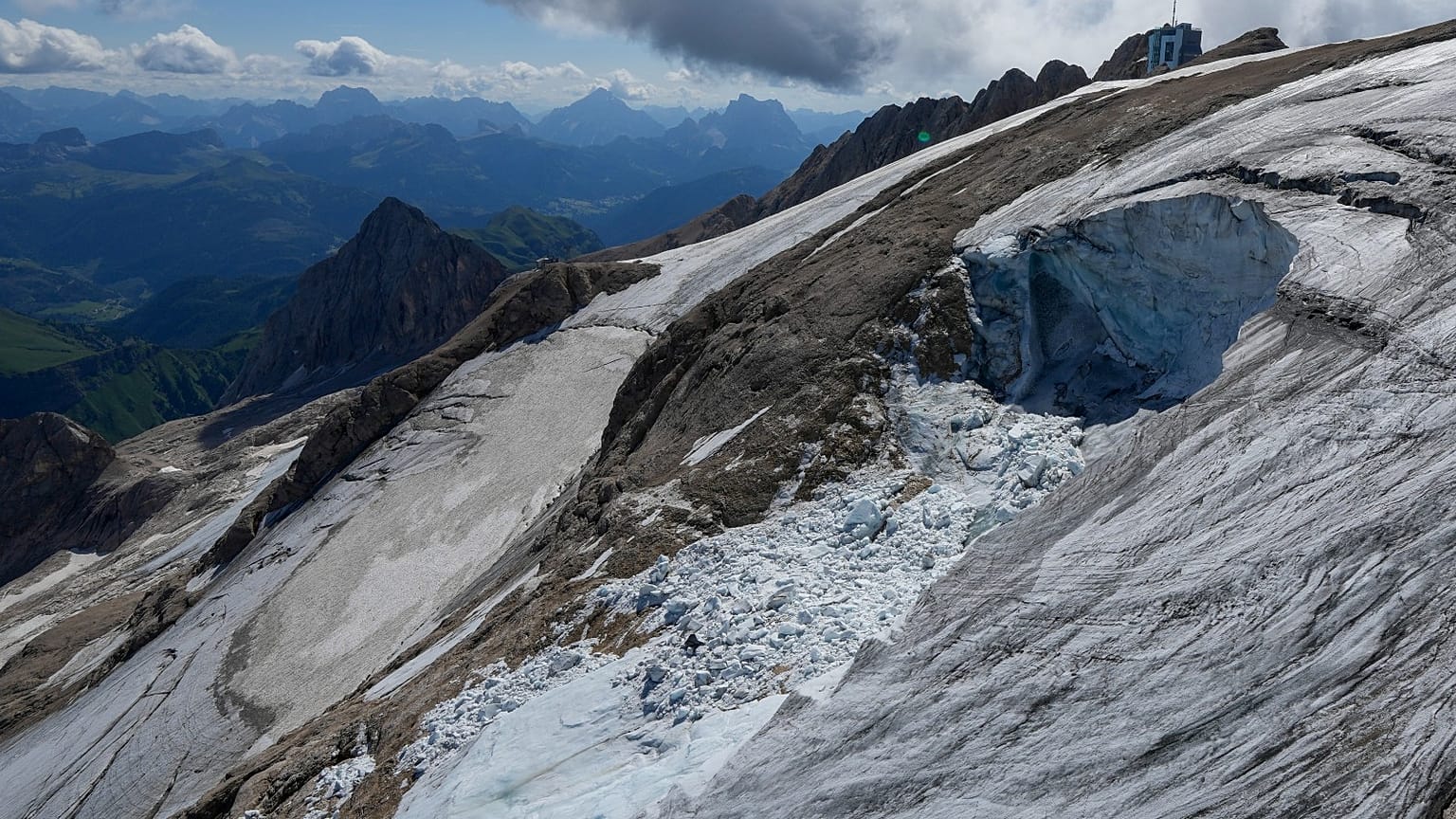 A view taken from a rescue helicopter of the Punta Rocca glacier near Canazei, in the Italian Alps in northern Italy, Tuesday, July 5, 2022.