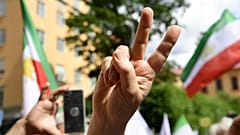 The verdict and sentence were welcomed by crowds outside the court in Stockholm.