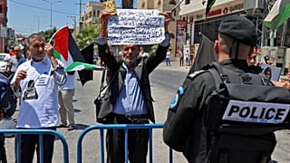 Un manifestant palestinien à Bethléem (Cisjordanie) avant l'arrivée du président Biden, le 15 juillet 2022