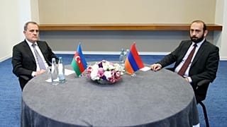 Foreign Minister of Azerbaijan Jeyhun Bayramov and Armenian Foreign Minister Ararat Mirzoyan looking on during a meeting in Tbilisi on 16 July 2022