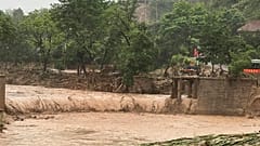 Flash floods kill at least a dozen people in north-west and south-west China