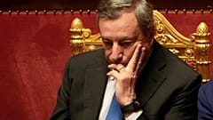 Italian Premier Mario Draghi pauses at the end of a debate at the Senate in Rome, Wednesday, July 20, 2022.