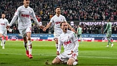 Cologne's Dejan Ljubicic, Salih Ozcan, and scorer Ondrej Duda celebrate a goal during a match between FC Cologne and Borussia Moenchengladbach Saturday, Nov 27, 2021.