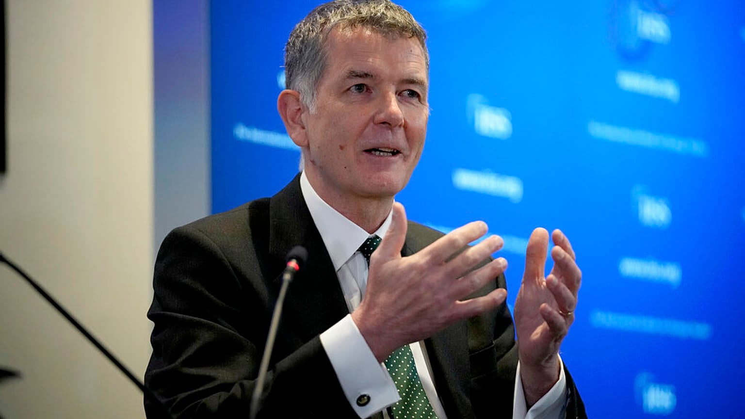 Richard Moore, the Chief of Britain's Secret Intelligence Service, also known as MI6, answers questions on November 30, 2021.