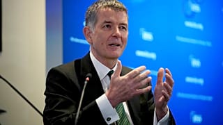Richard Moore, the Chief of Britain's Secret Intelligence Service, also known as MI6, answers questions on November 30, 2021.