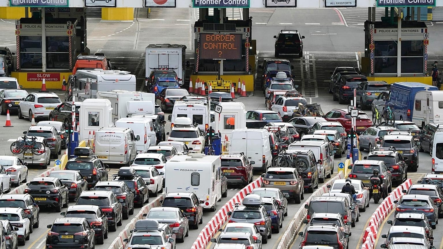 Car queue at the check-in at Dover Port as many families embark on getaways at the start of summer holidays for many schools in England and Wales.