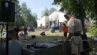 A DJ spins the tunes as volunteers clear up
