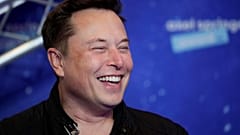 SpaceX owner and Tesla CEO Elon Musk arrives on the red carpet for the Axel Springer media award, in Berlin, Germany, Tuesday, Dec. 1, 2020.