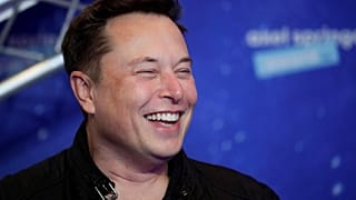 SpaceX owner and Tesla CEO Elon Musk arrives on the red carpet for the Axel Springer media award, in Berlin, Germany, Tuesday, Dec. 1, 2020.