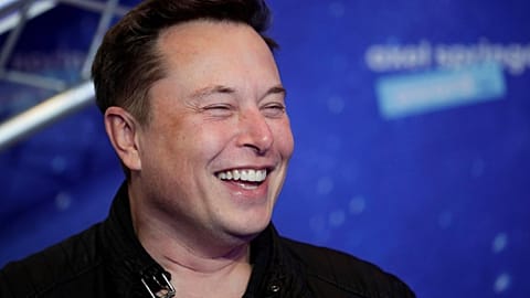 SpaceX owner and Tesla CEO Elon Musk arrives on the red carpet for the Axel Springer media award, in Berlin, Germany, Tuesday, Dec. 1, 2020.