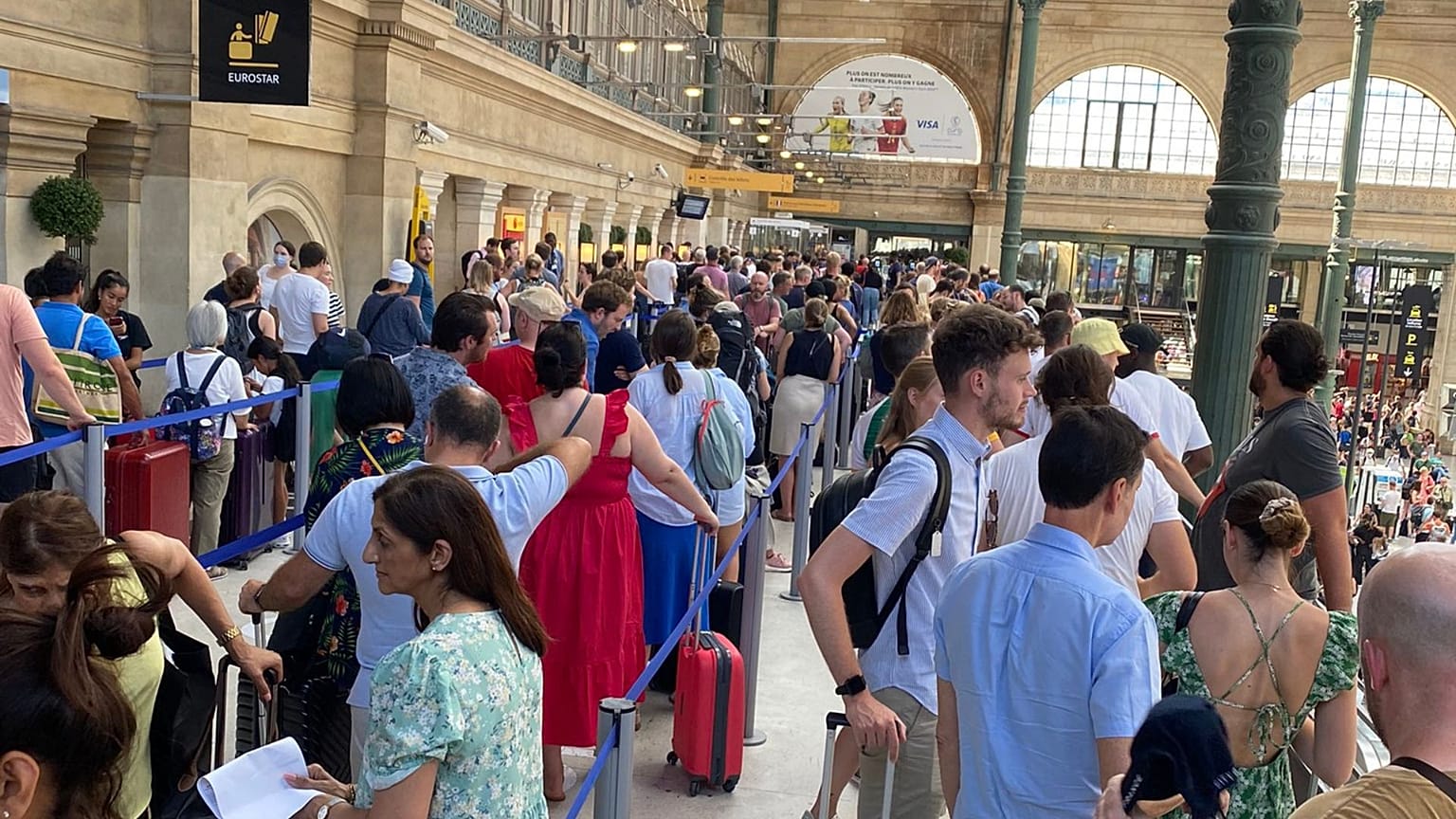 A queue of Eurostar travellers at Gare Du Nord on Sunday 24 July