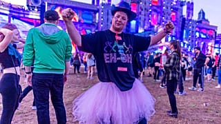 Spectators celebrate in front of the main stage of the electro festival "Airbeat One" in Neustadt-Glewe, Germany, Thursday, July 7, 2022. 