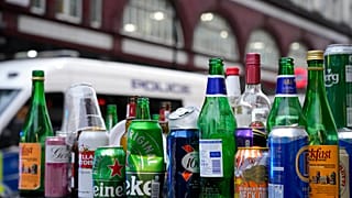 Empty bottles and cans of alcohol left behind by partying Scotland fans in Leicester Square in London, June 18, 2021.