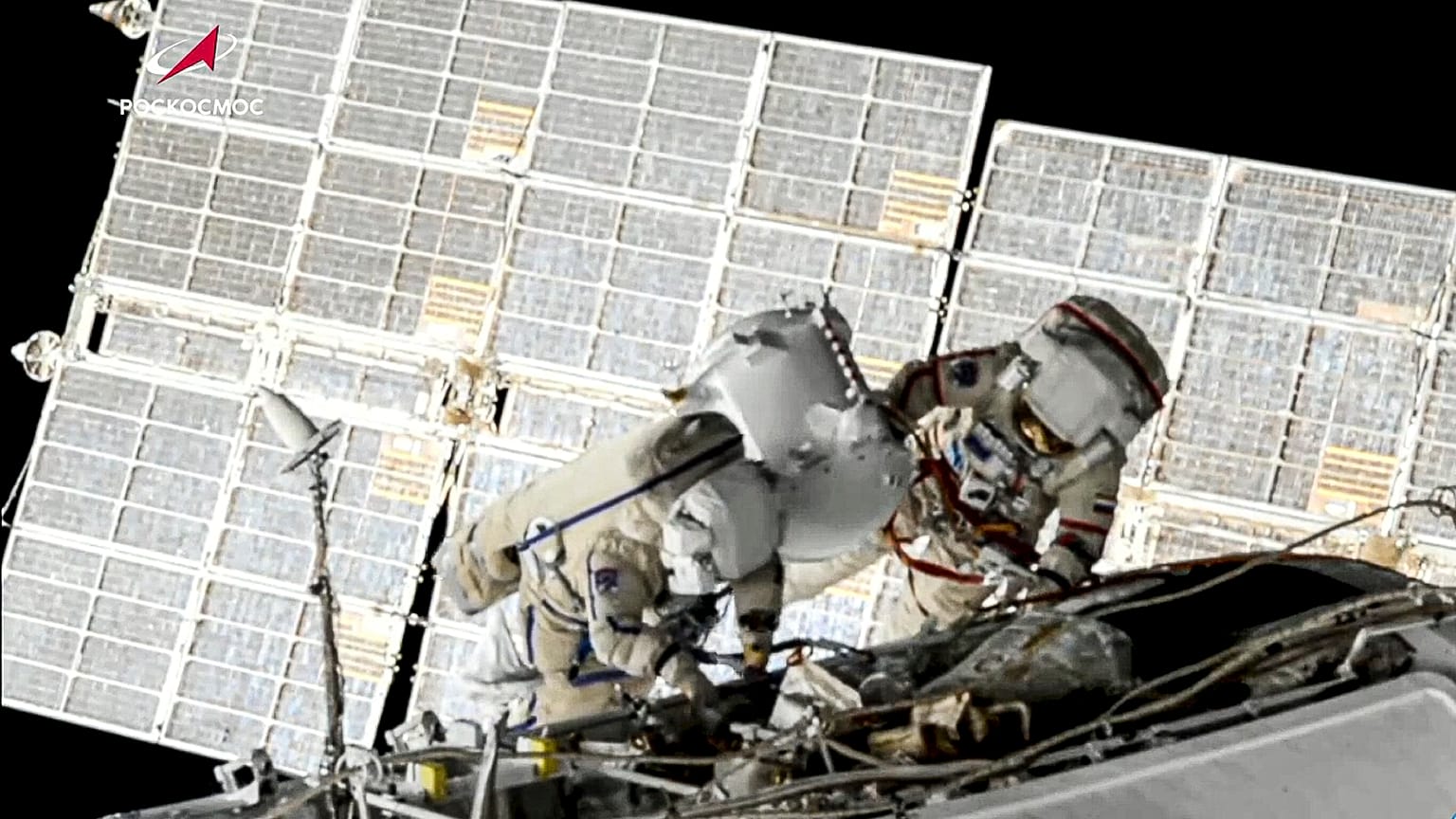 Russian cosmonauts Oleg Novitsky and Pyotr Dubrov, members of the crew to the International Space Station (ISS), perform their first spacewalk 