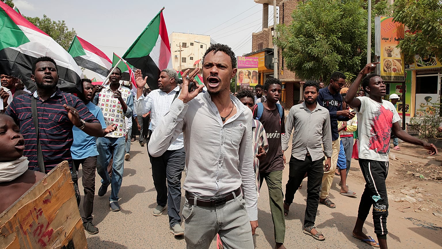 Hundreds of Sudanese rallied against last year's military coup during a demonstration on the streets of Khartoum, 26 July 2022