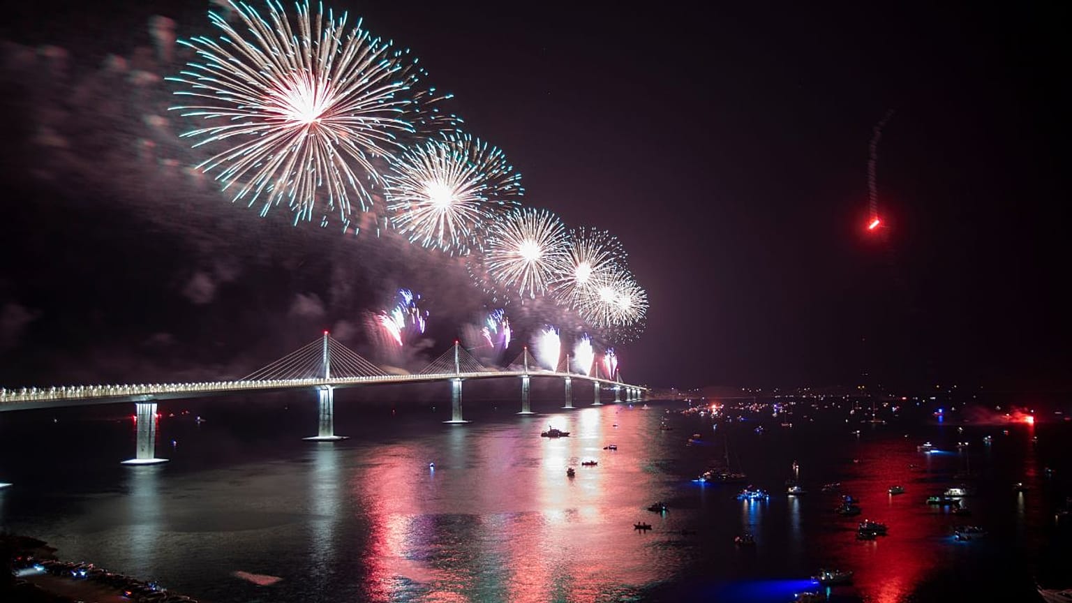 Fireworks illuminate skies over the newly built Peljesac Bridge in Komarna, southern Croatia, Tuesday, July 26, 2022.