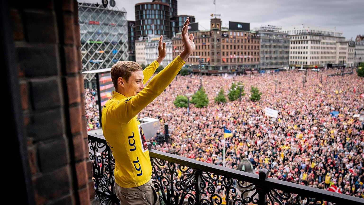 Jumbo-Visma team's Danish winner of the 109th edition of the Tour de France Jonas Vingegaard is cheered on return at Copenhagen City Hall in Copenhagen. July 27, 2022