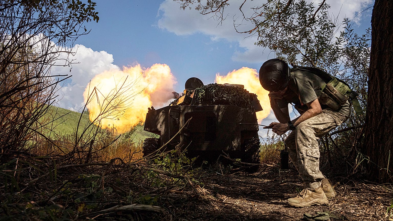 Ukrainian self-propelled artillery shoots towards Russian forces at a frontline in Kharkiv region, 27 July 2022