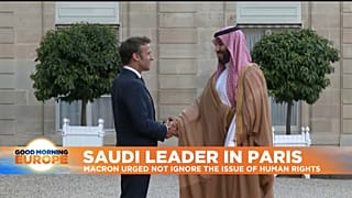 French President Emmanuel Macron greets the Saudi Crown Prince