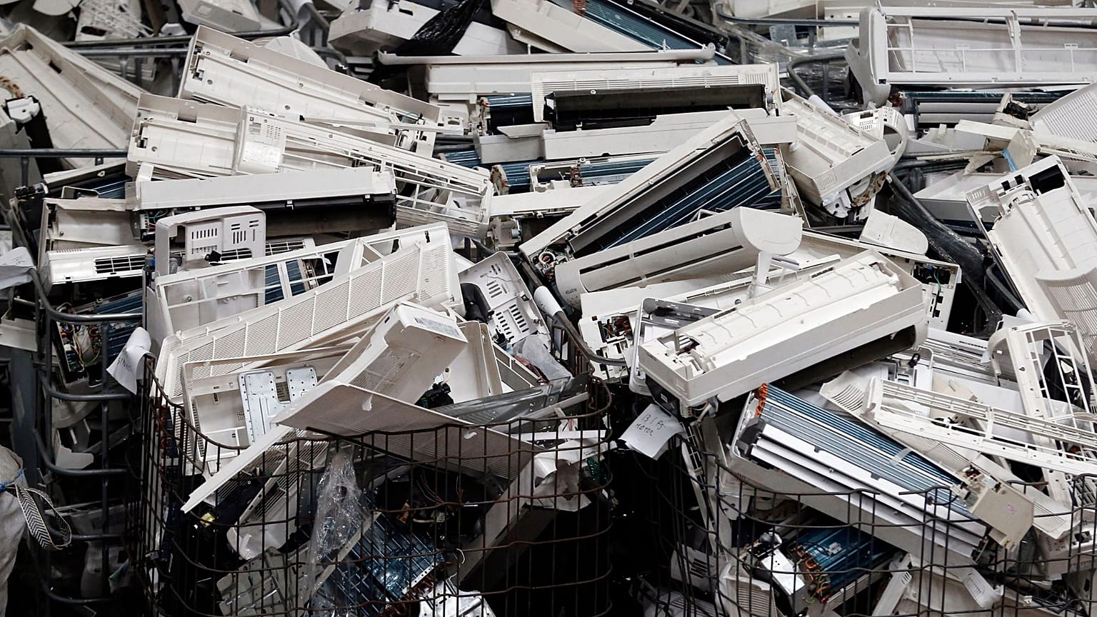 Parts of air-conditioning devices at a recycling facility in 2013