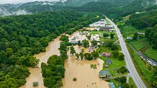 Homes and structures are flooded near Quicksand, Ky., Thursday, July 28, 2022.