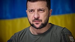 FILE: Ukrainian President Volodymyr Zelenskyy, attends a meeting with military officials during his visit the war-hit Dnipropetrovsk region. 8 July 2022