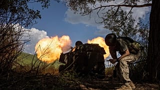 Ukrainian self-propelled artillery shoots towards Russian forces at a frontline in Kharkiv region, Ukraine, Wednesday, July 27, 2022. 