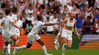 England's Chloe Kelly, right, celebrates after scoring her side's second goal during the Women's Euro 2022 final