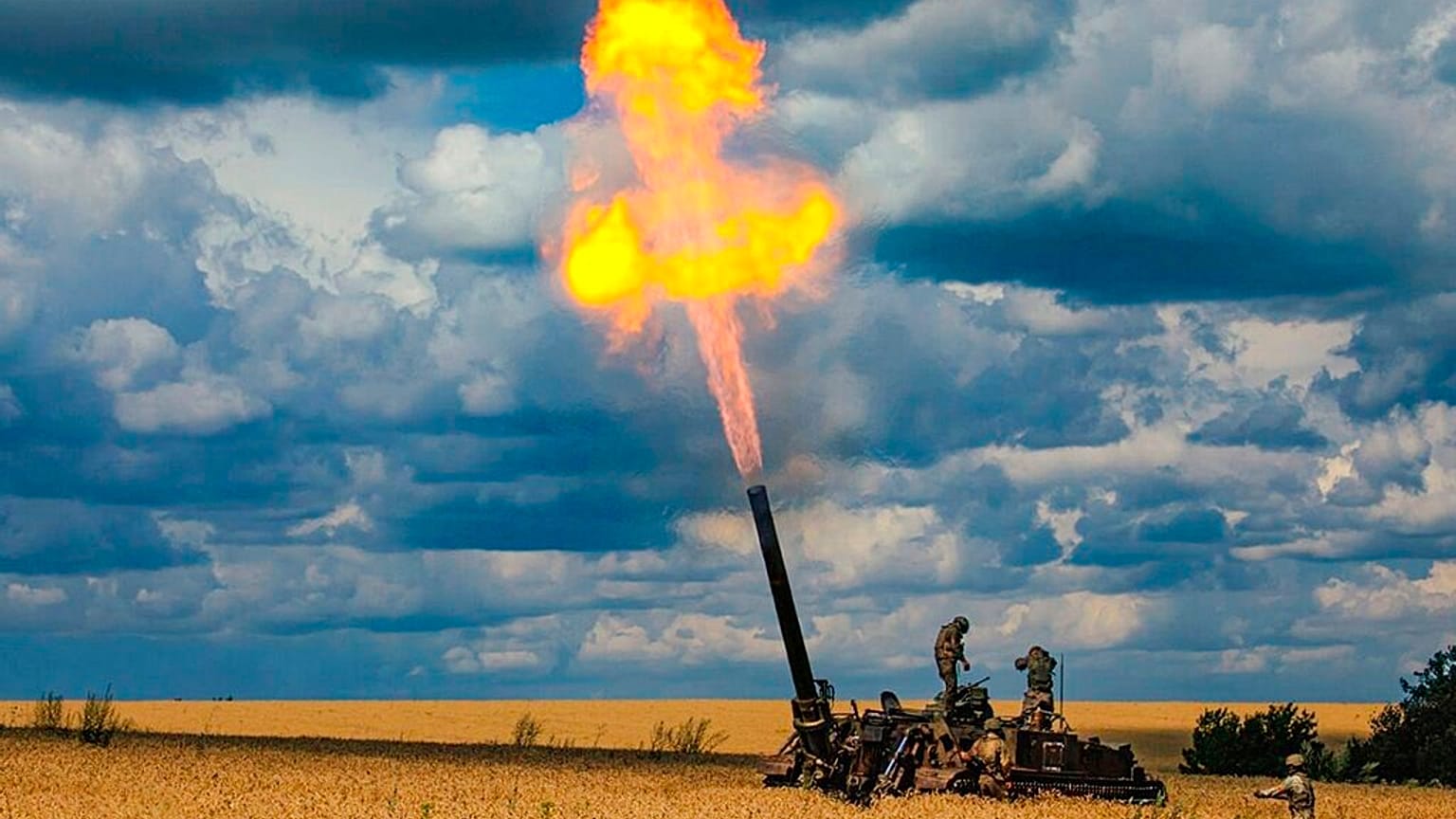 Russian troops fire a 2S4 Tyulpan self-propelled heavy mortar from their position at an undisclosed location Kharkiv region amid Russia's military offensive, August 1, 2022.