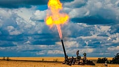 Russian troops fire a 2S4 Tyulpan self-propelled heavy mortar from their position at an undisclosed location Kharkiv region amid Russia's military offensive, August 1, 2022.