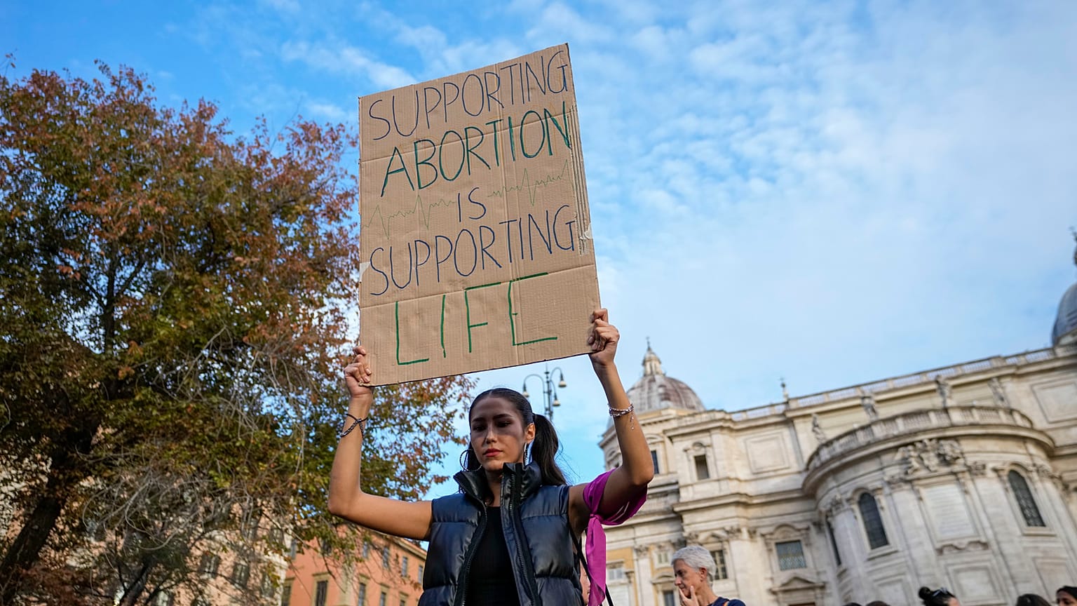 People stage a protest on 'International Safe Abortion Day' in Rome. Wednesday, 28 September 2022.