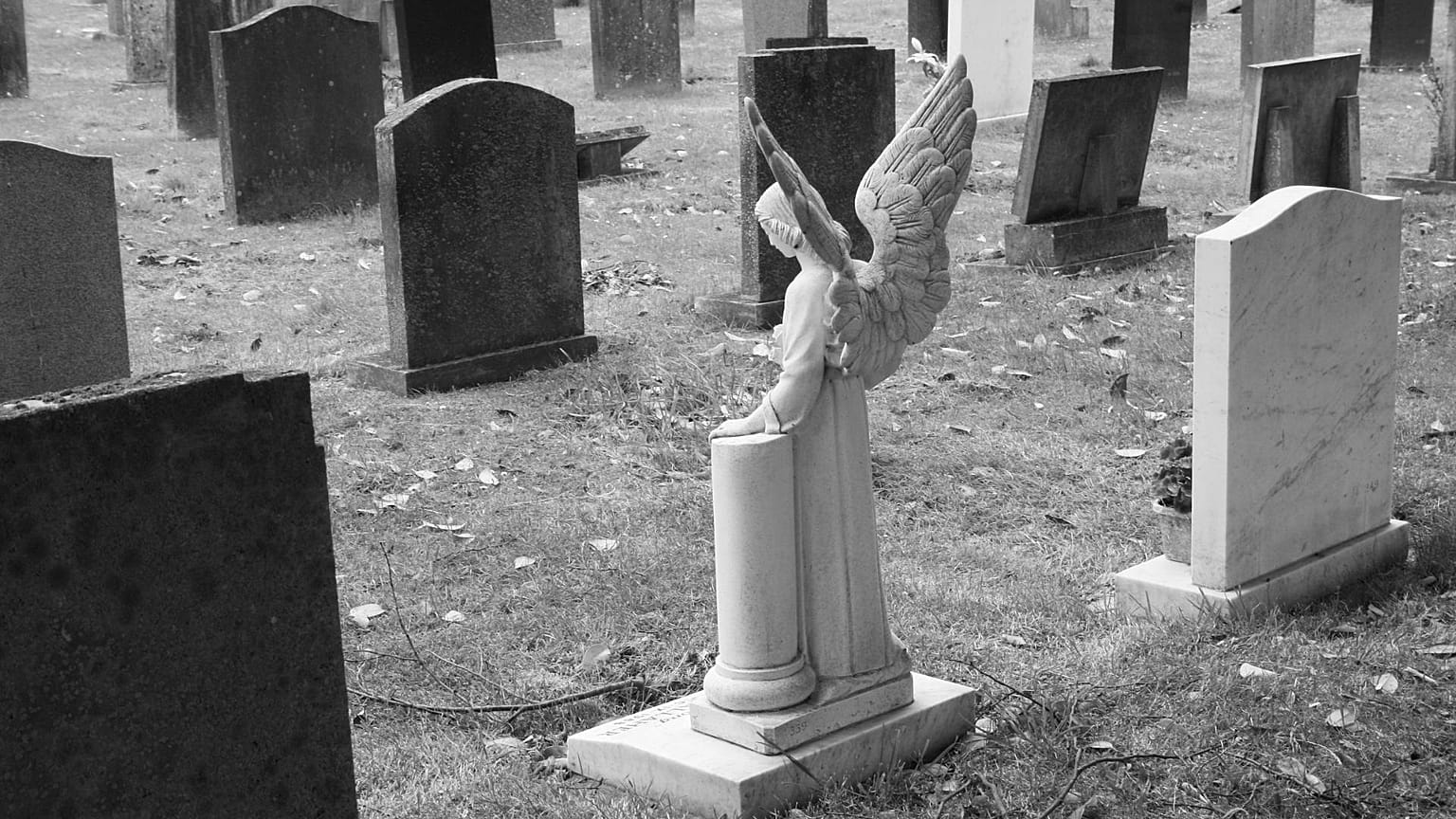 A angel headstone in a cemetery