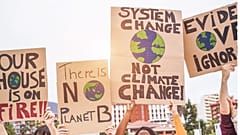 A group of climate change protestors urge government to take action on global heating