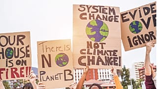 A group of climate change protestors urge government to take action on global heating