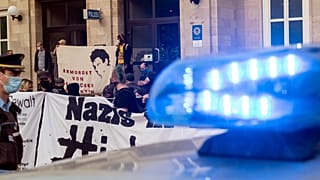 People attend an anti-racism demonstration in Dessau, Germany.