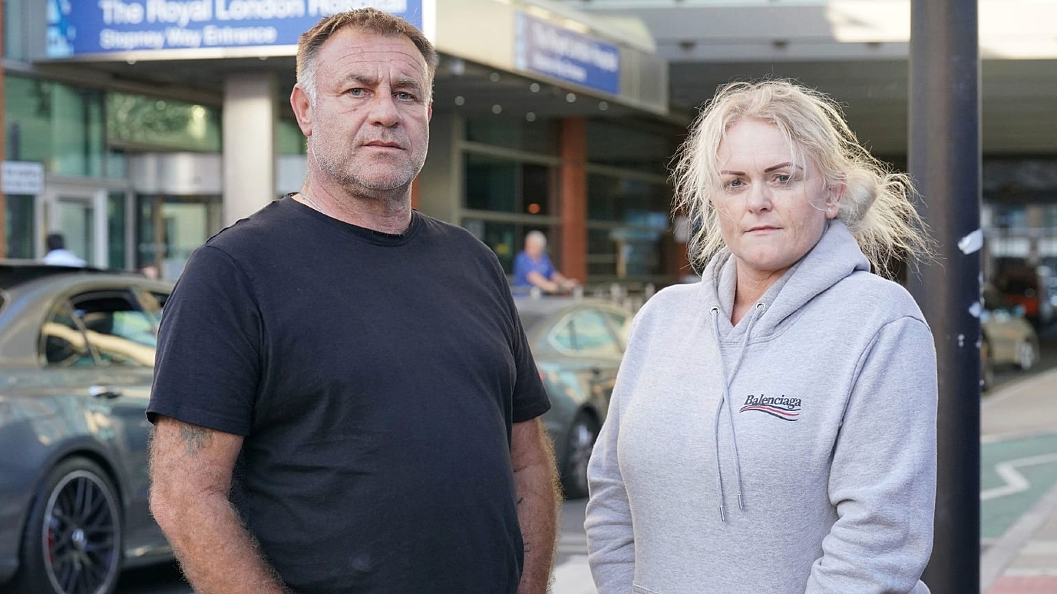 The parents of Archie Battersbee, Paul Battersbee and Hollie Dance, outside the Royal London hospital in Whitechapel, east London, Aug. 2, 2022.