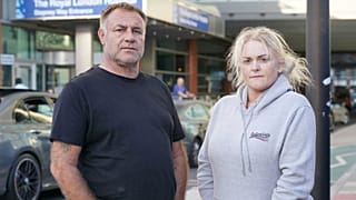 The parents of Archie Battersbee, Paul Battersbee and Hollie Dance, outside the Royal London hospital in Whitechapel, east London, Aug. 2, 2022.