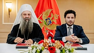 Serbian Orthodox Church Patriarch Porfirije and Montenegrin PM Dritan Abazović sign the property contract in Podgorica, 3 August 2022