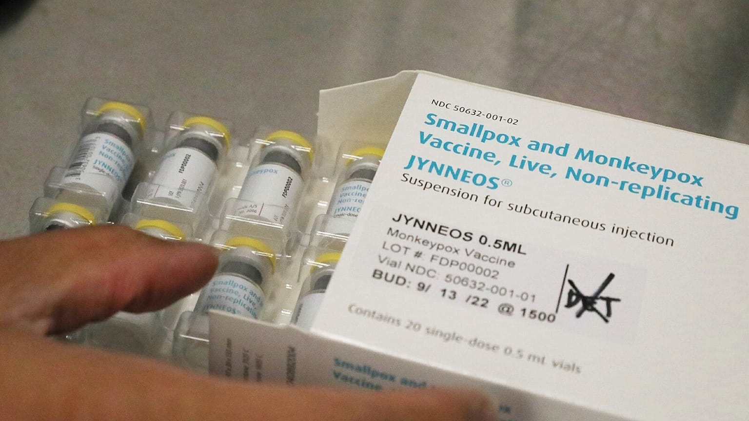 A pharmacist, removes a tray of vials of the Jynneos vaccine for monkeypox in the vaccine hub at Zuckerberg San Francisco General Hospital on July 29, 2022