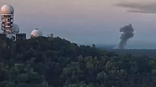 A billow of smoke is seen after an explosion at a blasting site inside the Grunewald forest in Berlin, 4 August 2022