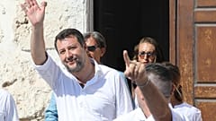 Matteo Salvini and Leader of The League party, leaves the town hall building during his visit in the Sicilian Island of Lampedusa, Italy (AP Photo/David Lohmueller))