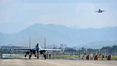 Air force and naval aviation corps of the Eastern Theatre Command of the Chinese People's Liberation Army fly planes at an unspecified location in China, Aug. 4, 2022.